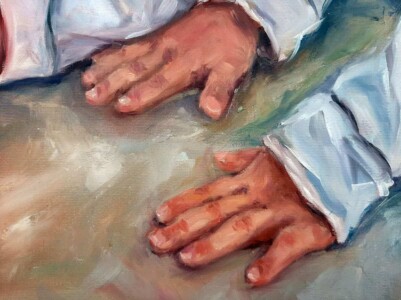 Pequenas mãos de crianças pintadas em um quadro personalizado feito à mão.